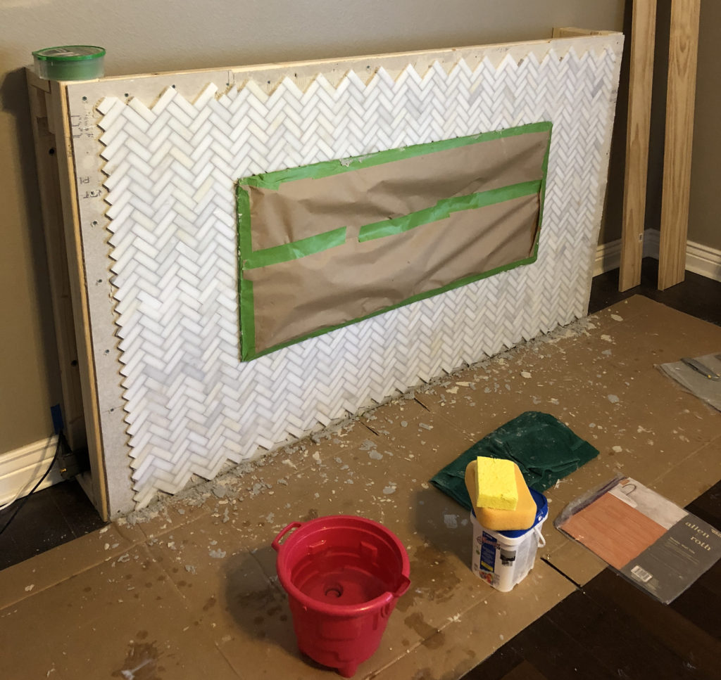 tiled and grouted fireplace mantle